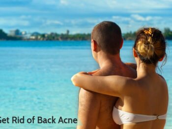 Sexy couple staring at the beach